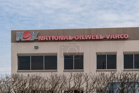 Photo for Houston, TX, USA - March 2, 2022: NOV National Oilwell Varco sign on the building at its headquarters in Houston, TX, USA. NOV Inc. is an American multinational corporation. - Royalty Free Image