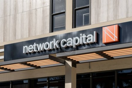 Photo for Miami, Florida, USA - January 2, 2022: Network Capital sign is shown at their regional office in Miami, Florida, USA. Network Capital is a Fintech direct mortgage lender and servicer. - Royalty Free Image