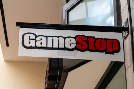 Photo for Houston, Texas, USA - March 6, 2022: GameStop store projecting sign at a shopping mall in Houston, Texas, USA, an American video game, consumer electronics, and gaming merchandise retailer. - Royalty Free Image
