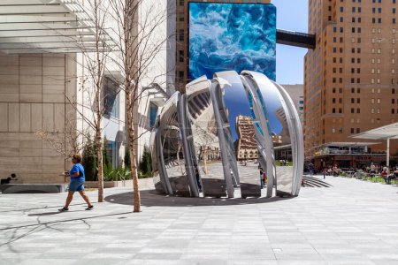 Photo for Dallas, Texas, USA - March 20, 2022: A mirrored surface sculpture at ATT Discovery District in Dallas, Texas, USA. The ATT Discovery District is a downtown destination in Dallas. - Royalty Free Image
