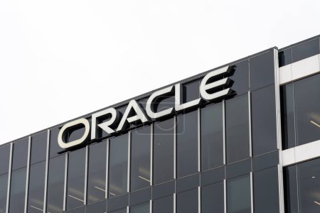 Photo for Austin, Texas, USA - March 17, 2022: Closeup of Oracle sign on the building at its headquarters in Austin, Texas, USA. Oracle Corporation is an American multinational computer technology corporation. - Royalty Free Image