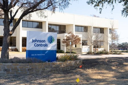 Photo for Irving, Texas, USA - March 20, 2022: The sign for Johnson Controls office in Irving, Texas, USA. Johnson Controls International is an American Irish-domiciled multinational conglomerate. - Royalty Free Image