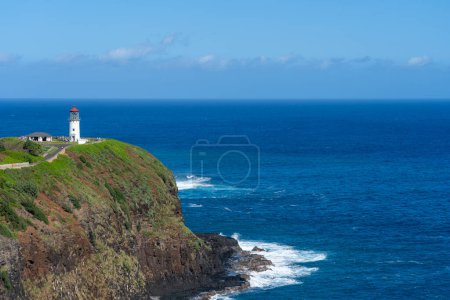 Photo for Kilauea Lighthouse: Majestic coastal beacon in Hawaii, perched on Kauai's northern cliffs, Iconic structure built in 1913, offers breathtaking views and now serves as a wildlife refuge, home to sea - Royalty Free Image