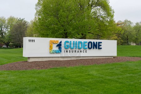 Photo for GuideOne Insurance ground sign outside the headquarters in West Des Moines, Iowa, USA, on May 6, 2023. GuideOne Insurance is an American niche-market insurer. - Royalty Free Image