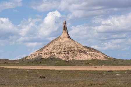 Photo for Chimney Rock National Historic Site in Morrill County, western Nebraska, USA, May 8, 2023. Chimney Rock is a prominent geological rock formation - Royalty Free Image