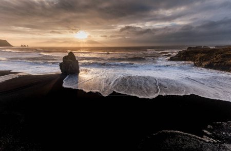 Photo for Black Sand Beach Reynisfjara in Iceland. Windy Morning. Ocean Waves - Royalty Free Image