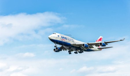 Photo for G-CIVZ British Airways Oneworld Livry Boeing 747 Landing in London Heathrow International Airport. England. - Royalty Free Image