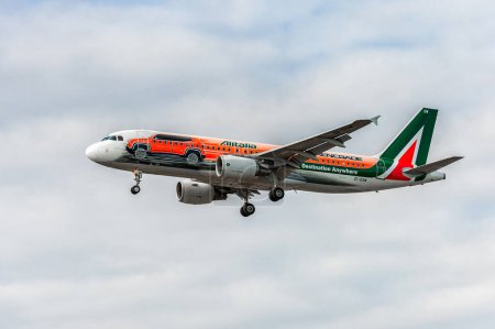 Photo for EI-DSW Alitalia Jeep Renegade Livery Airbus a320 Landing in London Heathrow International Airport. England. - Royalty Free Image