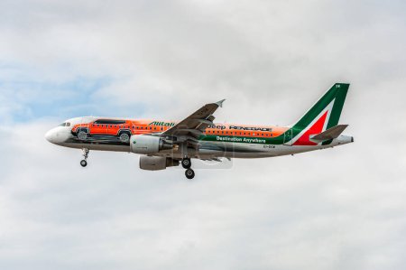 Photo for EI-DSW Alitalia Jeep Renegade Livery Airbus a320 Landing in London Heathrow International Airport. England. - Royalty Free Image
