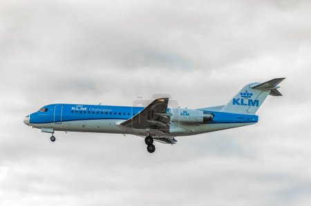 Photo for PH-KZB KLM Cityhopper Fokker 70 Landing in London Heathrow International Airport. England. - Royalty Free Image