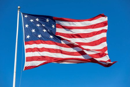 Photo for USA Flag Waving in Blue Background. Clear Blue Sky. American Wave Flag - Royalty Free Image