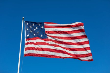 Photo for USA Flag Waving in Blue Background. Clear Blue Sky. American Wave Flag - Royalty Free Image