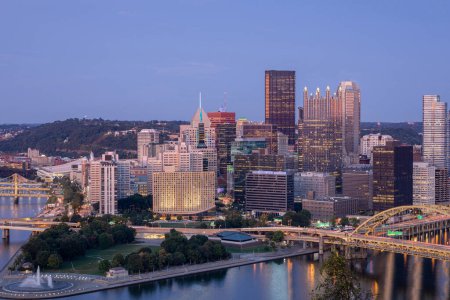 Photo for Cityscape of Pittsburgh and Evening Light. Fort Pitt Bridge in the Background. Beautiful Pittsburgh Skyline - Royalty Free Image