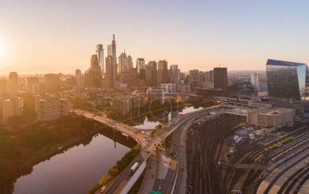 Photo for Beautiful Philadelphia Downtown Skyline with Schuylkill River in Foreground. Sunset Light. Business District in Background. Pennsylvania - Royalty Free Image