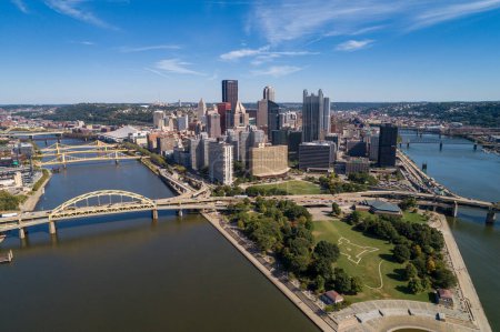 Photo for Pittsburgh Cityscape and Business District, Downtown Fort Duquesne Bridge in Background. Rivers and Bridges in Background. Pennsylvania. - Royalty Free Image