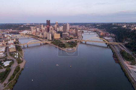Photo for Cityscape of Pittsburgh in the evening. Allegheny and Monongahela rivers are in Background. - Royalty Free Image
