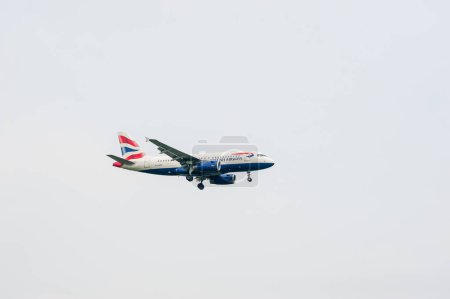 Photo for British Airways Airbus A319 G-EUOI landing in London Heathrow International Airport. - Royalty Free Image