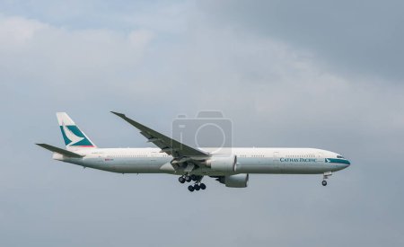 Photo for Cathay Pacific Airlines Boeing 777 B-KPZ landing in London Heathrow International Airport. - Royalty Free Image