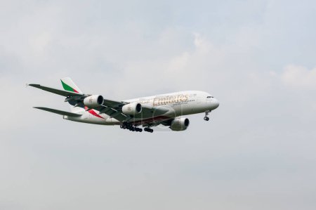 Photo for Emirates Airlines Airbus A380 A6-EDJ landing in London Heathrow International Airport. - Royalty Free Image