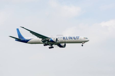 Photo for Kuwait Airlines Boeing 777 9K-AOC landing in London Heathrow International Airport. - Royalty Free Image