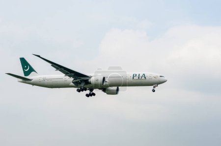 Photo for Pakistan International Airlines Boeing 777 AP-BMS landing in London Heathrow International Airport. - Royalty Free Image