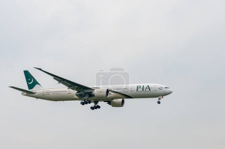 Photo for Pakistan International Airlines Boeing 777 AP-BID landing in London Heathrow International Airport. - Royalty Free Image