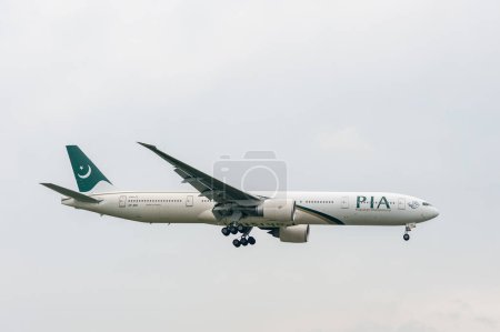 Photo for Pakistan International Airlines Boeing 777 AP-BID landing in London Heathrow International Airport. - Royalty Free Image