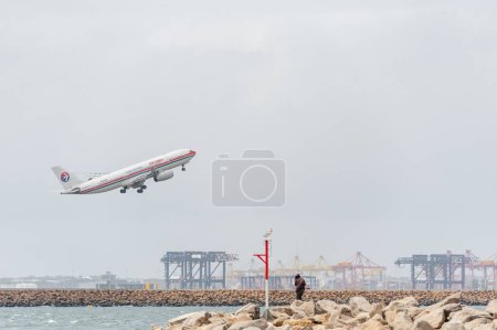 Photo for SYDNEY, AUSTRALIA - NOVEMBER 11, 2014: Sydnay International Airport With Take Off Airplane. Aircraft B-6122, Airbus A330-243, China Eastern Airlines - Royalty Free Image