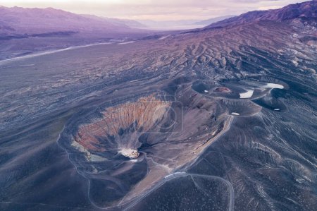 Téléchargez les photos : Sunrise in Ubehebe Crater. Death Valley, California. Beautiful Morning Colors and Colourful Landscape in Background. Sightseeing Place. Drone Viewpoint. - en image libre de droit