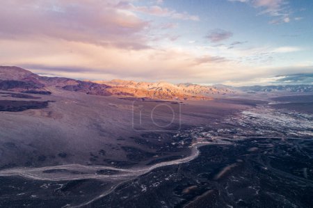 Photo for Sunrise in Ubehebe Crater. Death Valley, California. Beautiful Morning Colors and Colourful Landscape in Background. Sightseeing Place. Drone Viewpoint. - Royalty Free Image