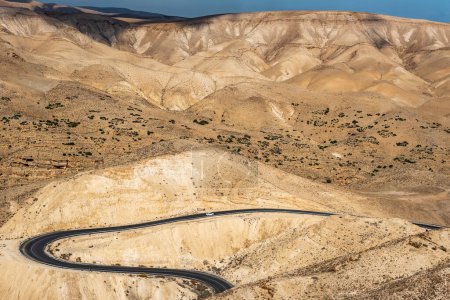 Téléchargez les photos : Landscape of Israel desert. Blue Cloudy Sky and road in background. Mountain. Judaean Desert - en image libre de droit