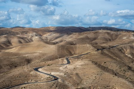 Photo for Landscape of Israel desert. Blue Cloudy Sky and road in background. Mountain. Judaean Desert - Royalty Free Image