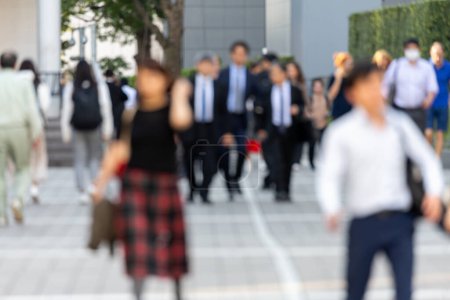 Photo for Blurry Business People in Tokyo, Japan. Shinjuku Area. Bright Sunny Day - Royalty Free Image