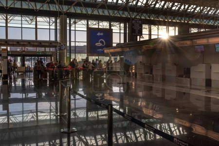 Photo for ROME, ITALY - OCTOBER 22, 2019: Rome international Leonardo da Vinci Fiumicino Airport interior with people. Departure and check-in area. - Royalty Free Image