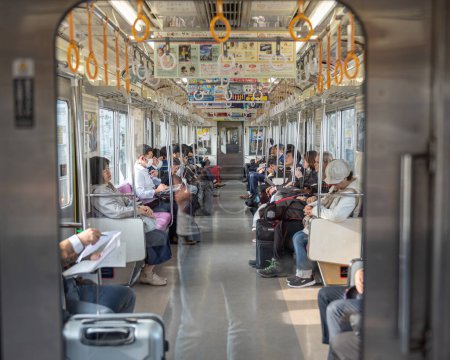 Téléchargez les photos : Train Interior and People are traveling to Narita International Airport, Tokyo, Japan. - en image libre de droit