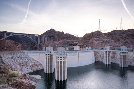 Photo for Hoover Dam is a concrete arch-gravity dam in the Black Canyon of the Colorado River, on the border between the U.S. states of Nevada and Arizona. - Royalty Free Image