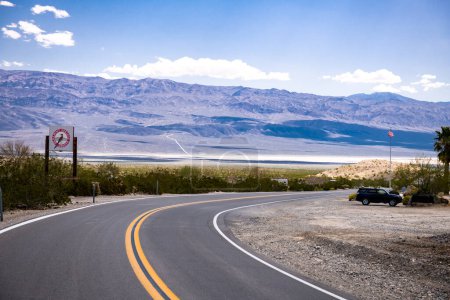 Photo for Empty Road in Death Valley, California. Paramint Springs Resort in background. USA - Royalty Free Image