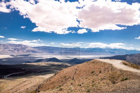 Téléchargez les photos : Landscape of Death Valley in California. Road and Cloudy Sky in Background. - en image libre de droit