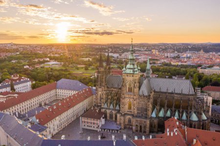 Photo for Prague Old Town with St. Vitus Cathedral and Prague castle complex with buildings revealing architecture from Roman style to Gothic 20th century. Czech Republic. Drone. Sunset - Royalty Free Image