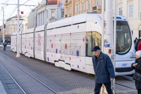 Photo for ZAGREB, CROATIA - JANUARY 04, 2020: New Modern  tram on a street of Zagreb, Croatia. Zagreb 2020 Council of the European Union - Royalty Free Image