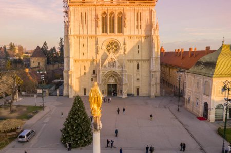 Foto de Zagreb Old Town And Cathedral in Background. Sightseeing Place in Croatia. Beautiful Sunset Light. Tourist Visiting Famous Place - Imagen libre de derechos