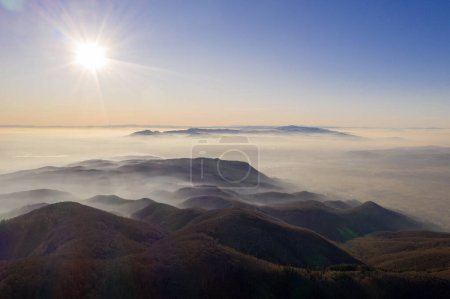 Photo for Zagreb Skyline in Croatia. Sunset Light Colorful Sky and Castle in Background. View from the top of Medvednica Mountain. Haze Background. - Royalty Free Image