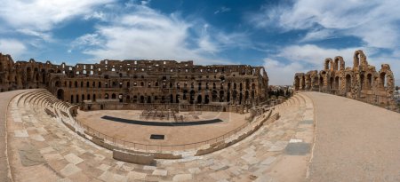 Photo for Amphitheatre of El Jem in Tunisia. Amphitheatre is in the modern-day city of El Djem, Tunisia, formerly Thysdrus in the Roman province of Africa. It is listed by UNESCO since 1979 as a World Heritage Site - Royalty Free Image