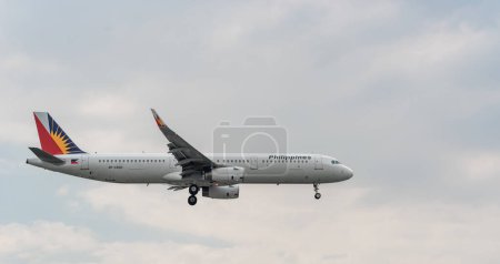 Téléchargez les photos : Philippine Airlines Airbus A321 RP-C9921 Atterrissage à l'aéroport international de Manille - en image libre de droit