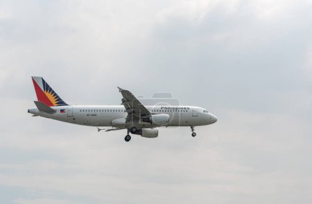 Foto de Philippine Airlines Airbus A320 RP-C8618 Landing in Manila International Airport - Imagen libre de derechos