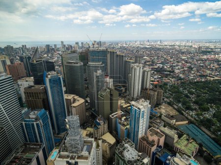 Photo for Manila Cityscape, Makati City with Business Buildings and Cloudy Sky. Philippines. Skyscrapers in Background. - Royalty Free Image