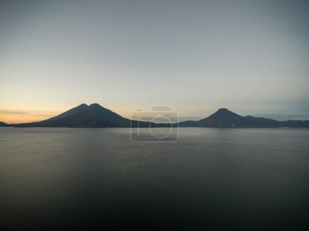 Photo for Volcano San Pedro and Volcano Atitlan in Background. Lake Atitlan in Foreground. Sightseeing Place in Guatemala - Royalty Free Image