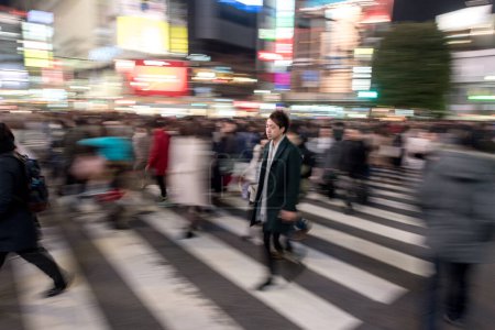 Photo for Shibuya District in Tokyo. Famous and busiest intersection in the world, Japan. Shibuya Crossing. Blurry Panning Car - Royalty Free Image