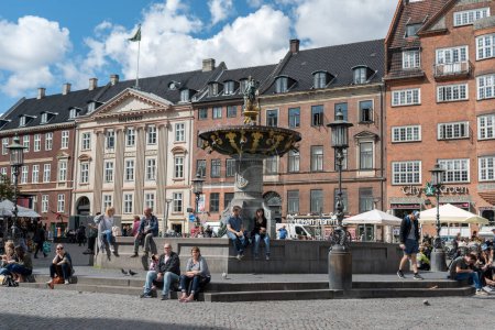 Photo for COPENHAGEN, DENMARK - AUGUST 22, 2017: Copenhagen Old Town And Famous Fountain with People - Royalty Free Image