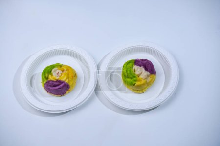A colorful market snack made from flour and other ingredients called blooming sponge cake
